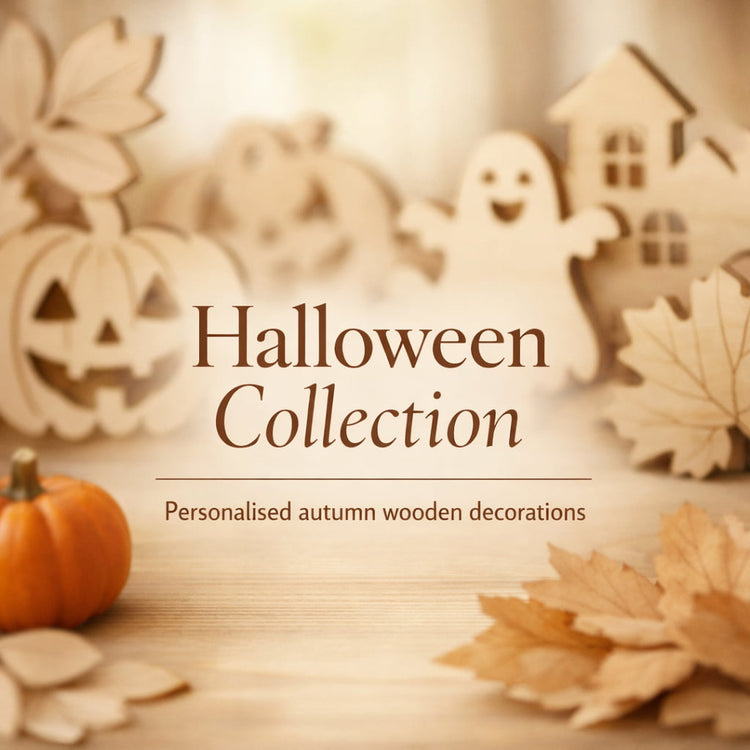 Personalised laser cut birch plywood Halloween ornaments with visible layered edges on soft autumn background