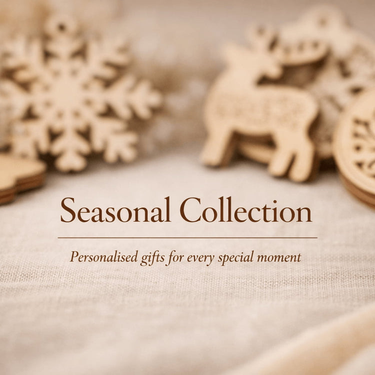 Personalised laser cut birch plywood seasonal decorations on neutral background with soft blurred styling