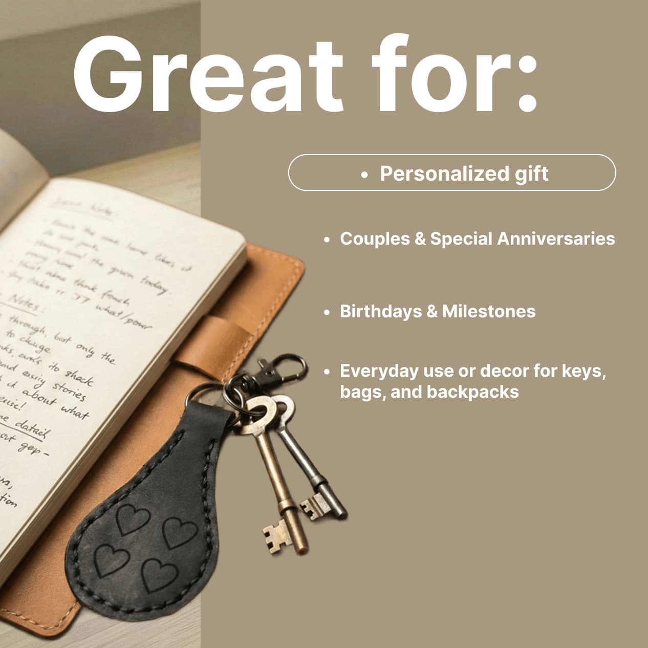 Personalized black leather keychain with embossed hearts attached to vintage keys on notebook