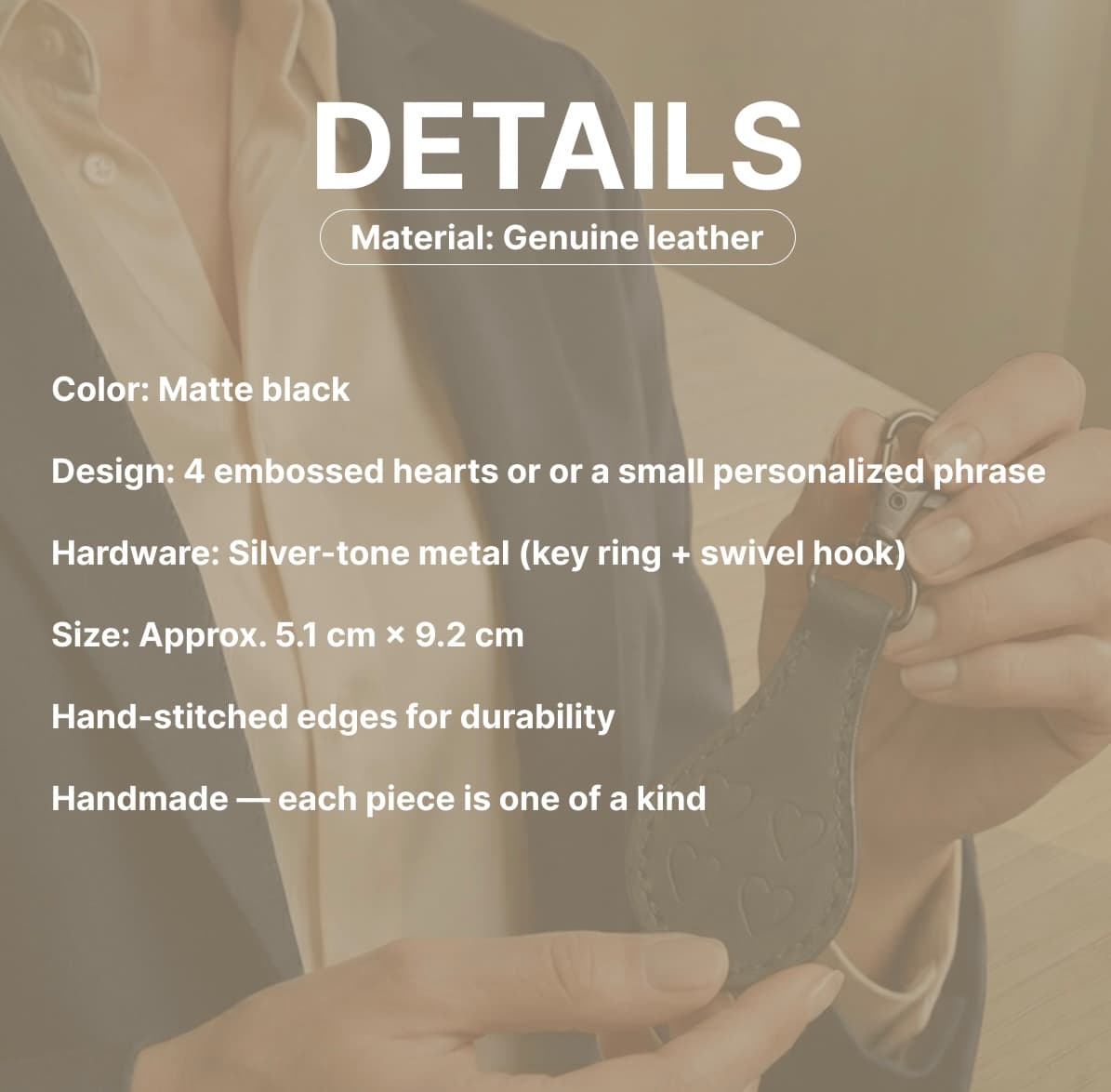 Handmade black leather keychain details showing genuine leather material stitching and metal key ring